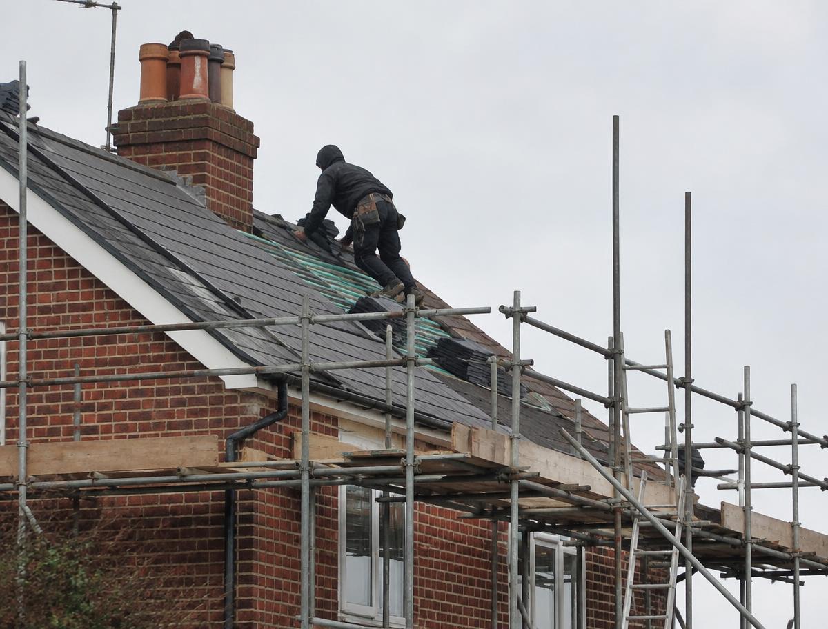 Small UK residential renovation with scaffolding